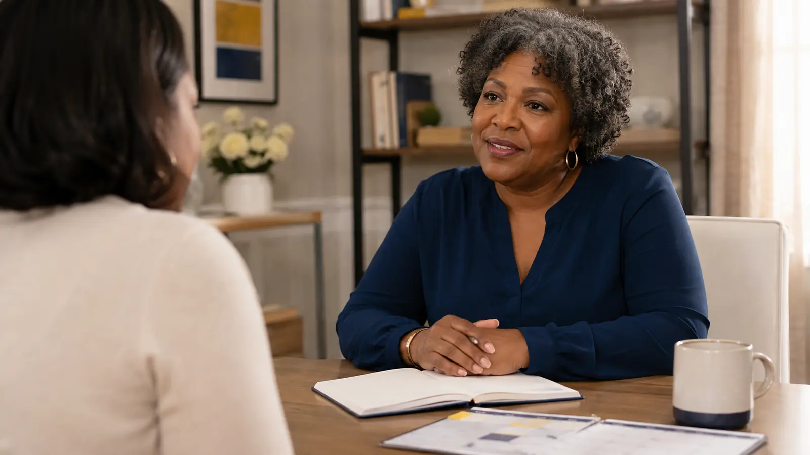 Adult over 50 calmly setting clear boundaries during a client conversation.